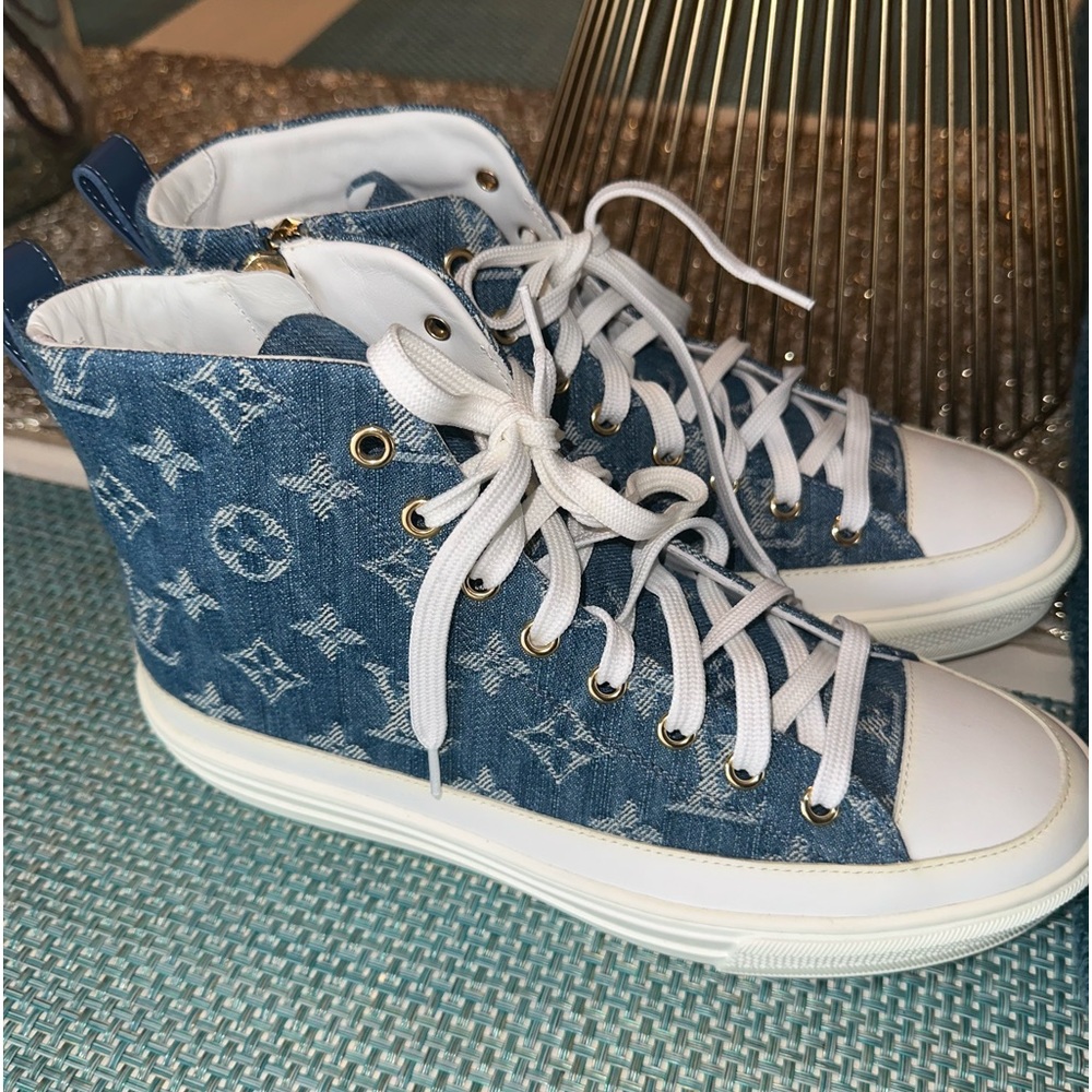 Brand new authentic blue jeans high top sneakers by Louis Vuitton.